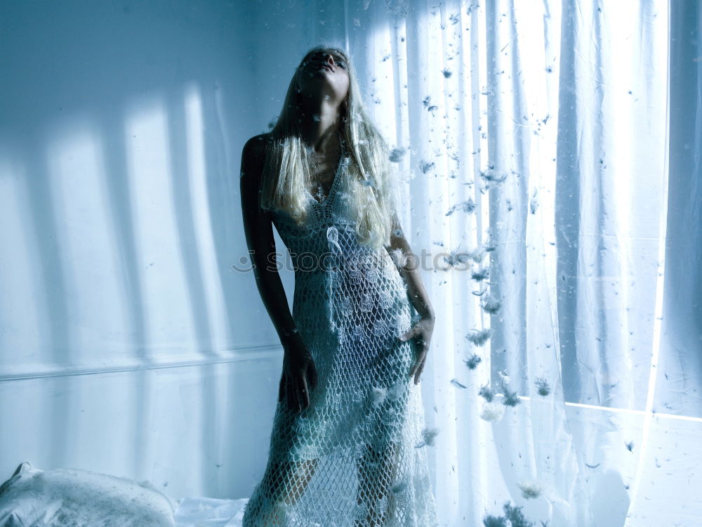 Similar – Double exposure portrait of a young woman, with flowers and branches in half-transparency