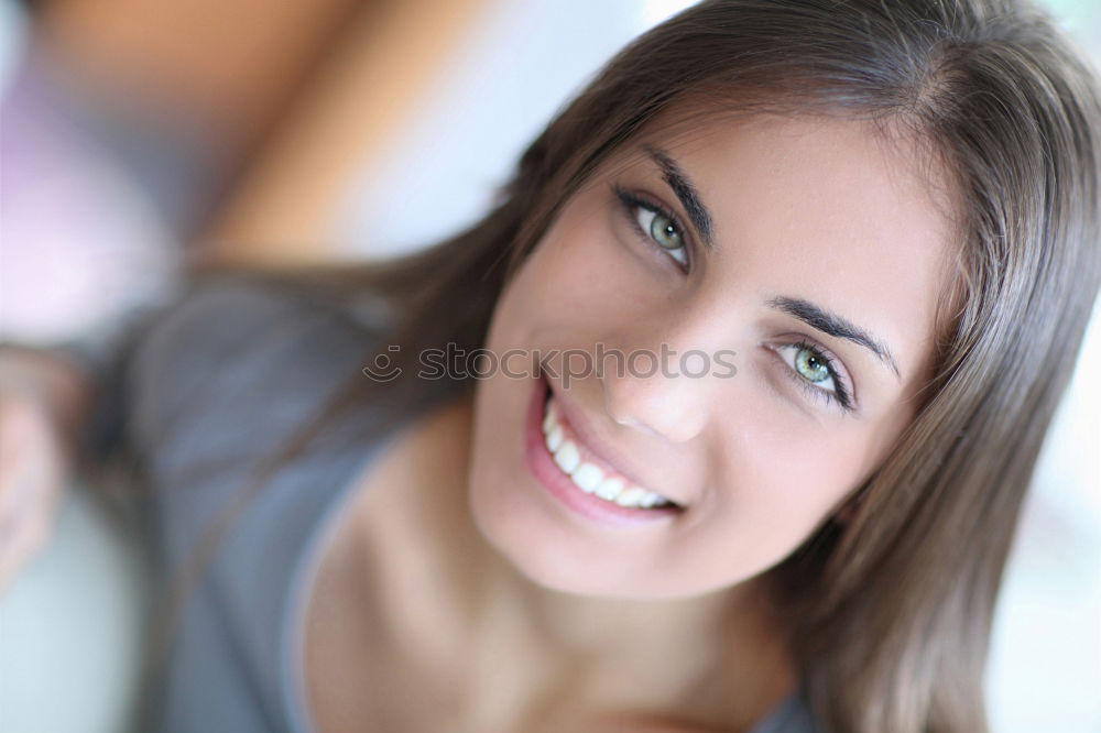 Similar – Close-up portrait of young woman with beautiful blue eyes