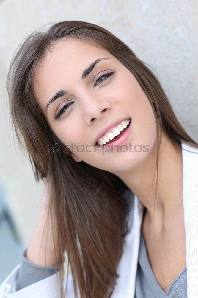 Similar – Young woman smiling in urban background