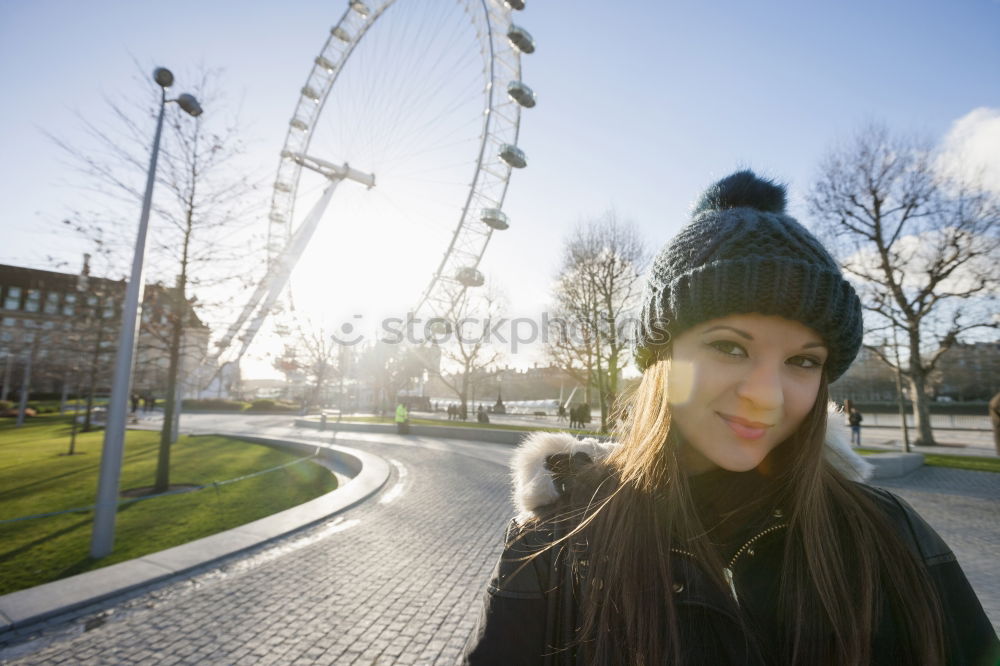 Similar – Woman lies at the river