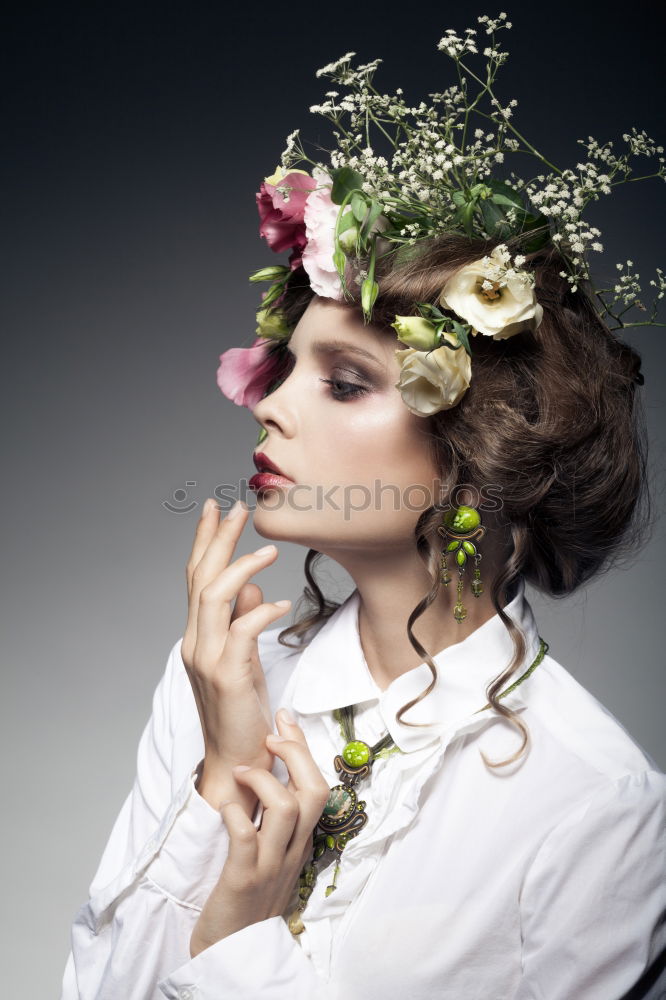 Similar – Young woman hugging a bouquet of flowers