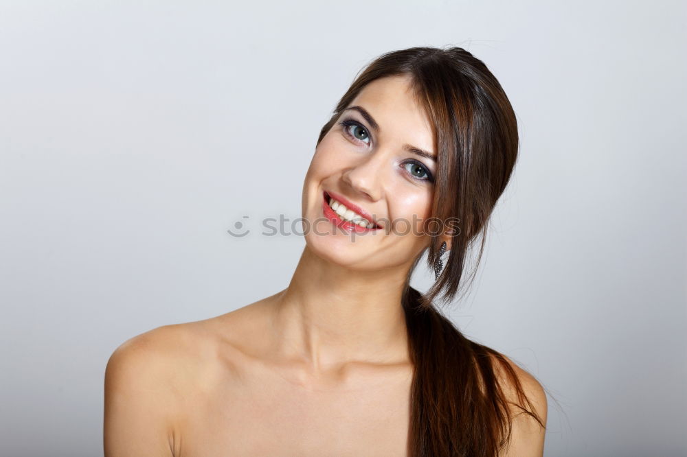 Similar – Portrait of a beautiful young woman smiling