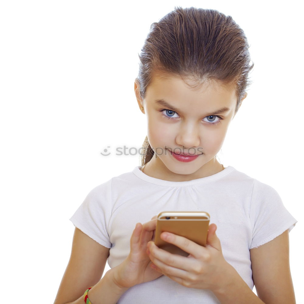 Similar – portrait of a beautiful kid using mobile phone