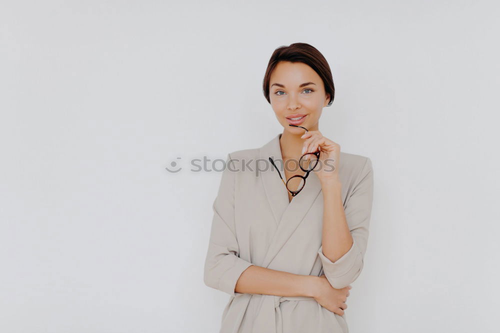 Similar – Image, Stock Photo Beautiful young businesswoman looking at camera.