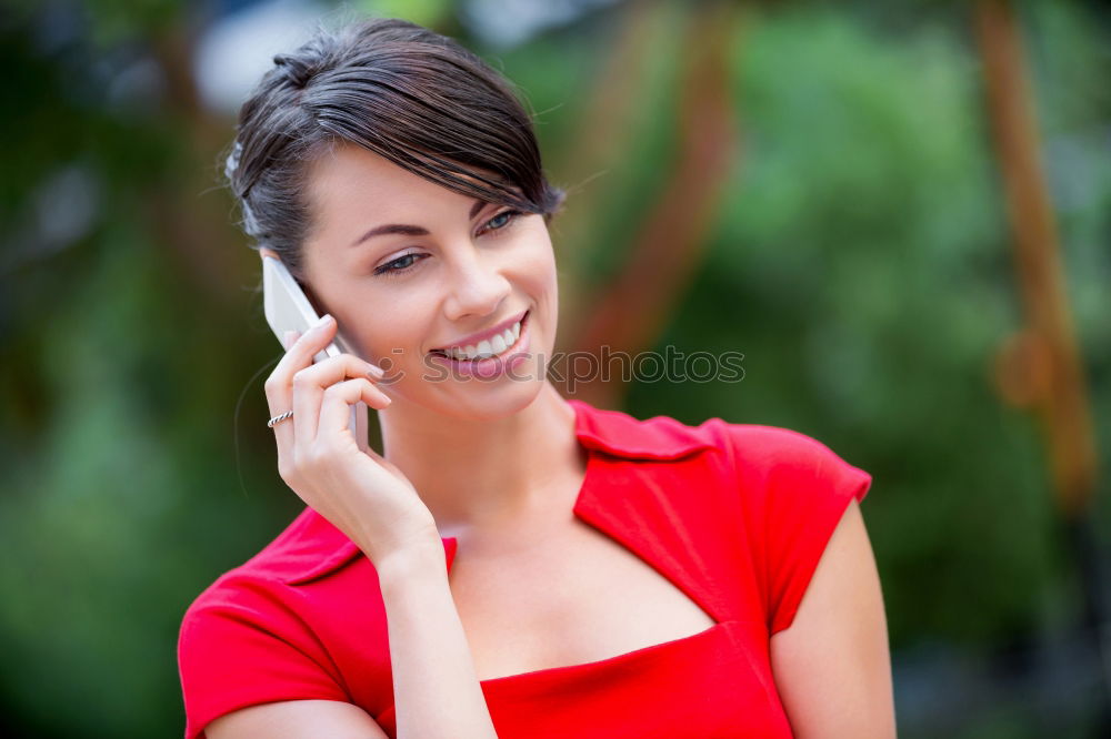 Similar – Smiling Woman in Autumn Fashion Talking on Phone