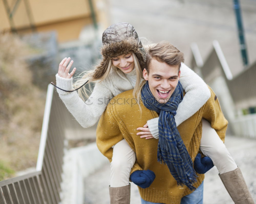 Similar – Young couple taking selfie photo with smartphone outdoors