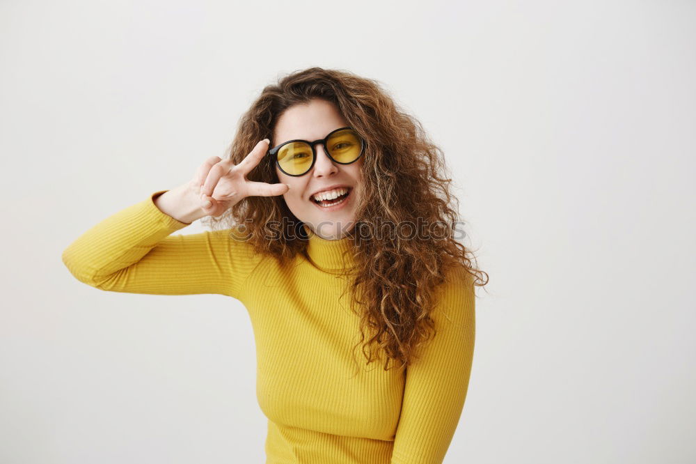 Similar – woman covering her eyes with pieces of sushi