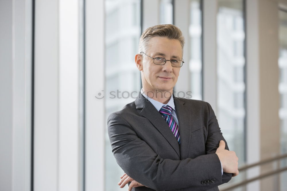 Similar – Determined man with glasses