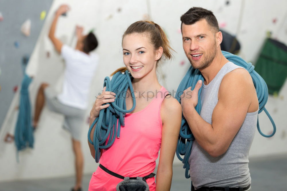 Sporty people cheering themselves in gym