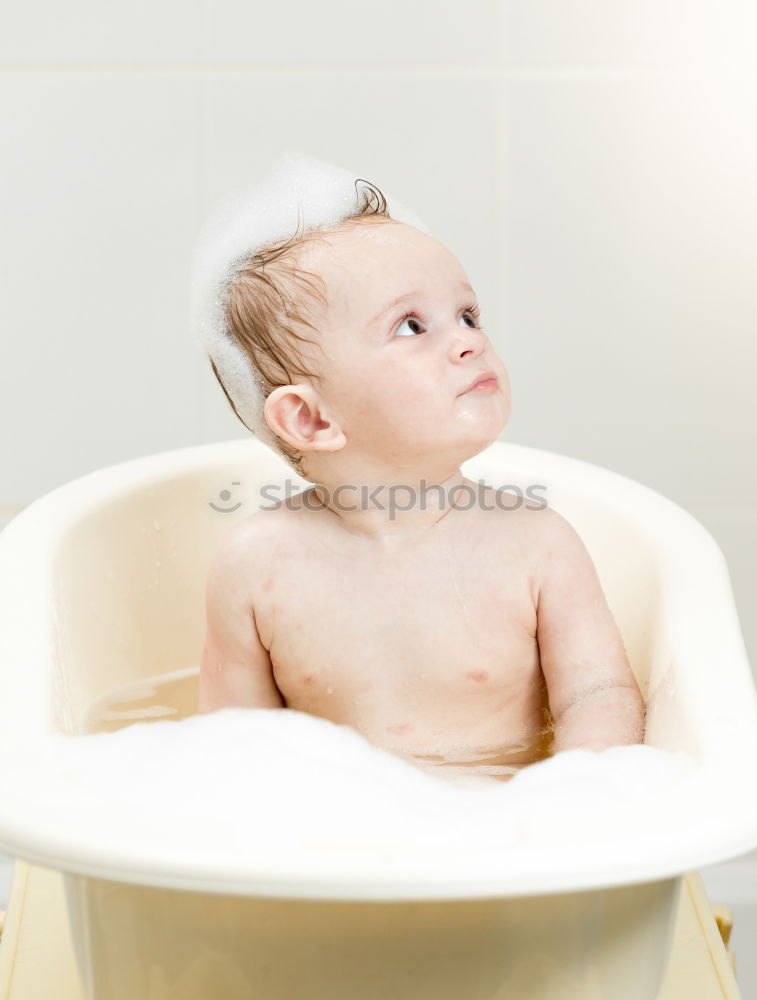 Similar – Image, Stock Photo Newborn taking bath