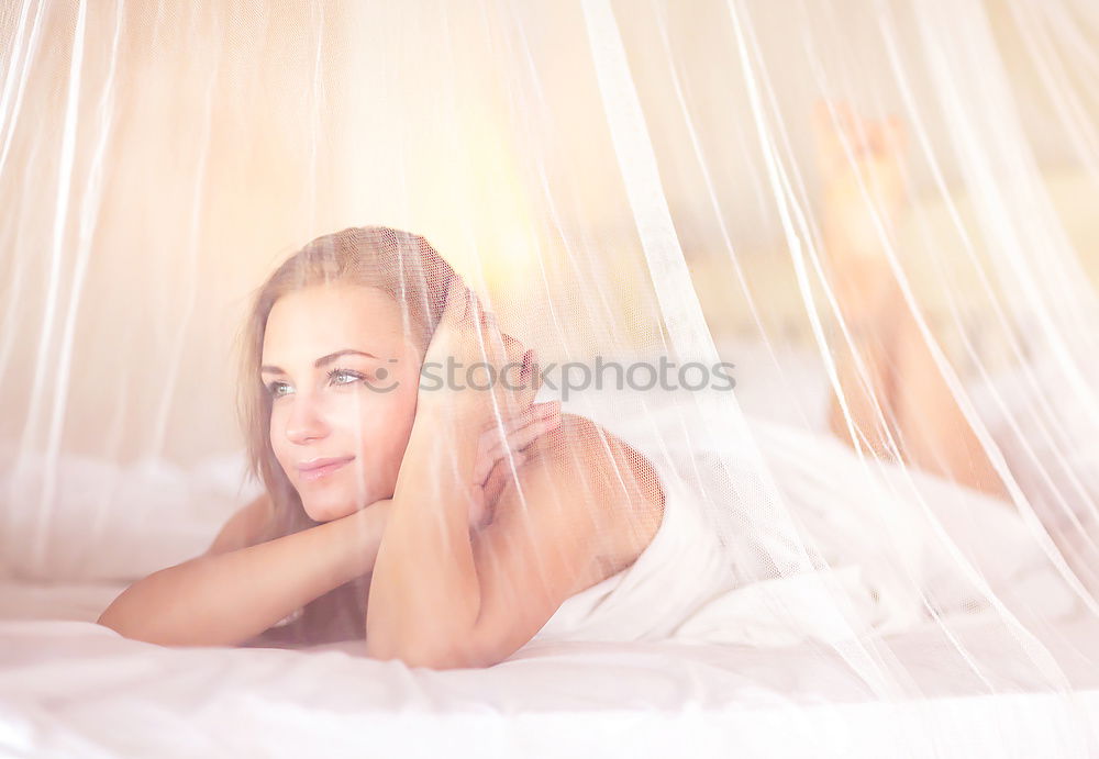 Similar – Image, Stock Photo Beautiful girl sitting in bed in white linens