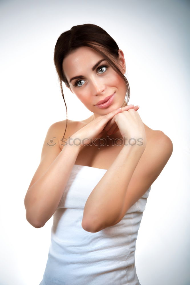 Similar – Girl with blonde hair posing in front of turquoise background