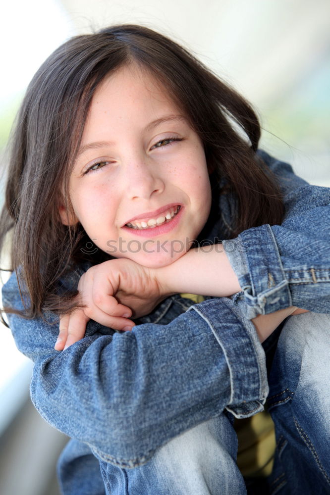 Similar – Adorable little girl with sweet smile lying down on bed.