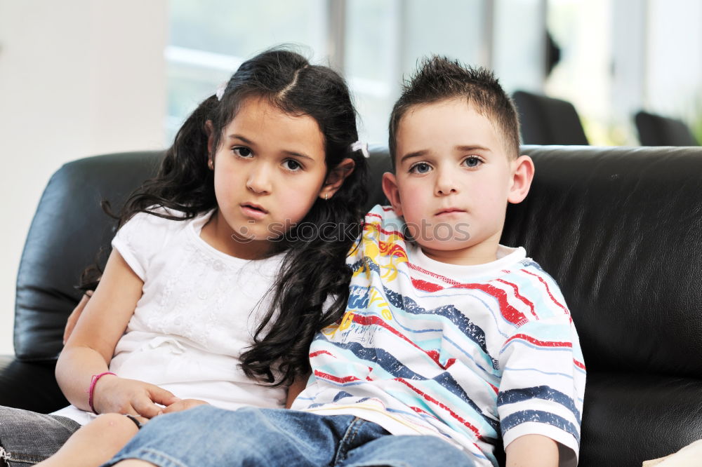 Similar – Three kids using a tablet at home