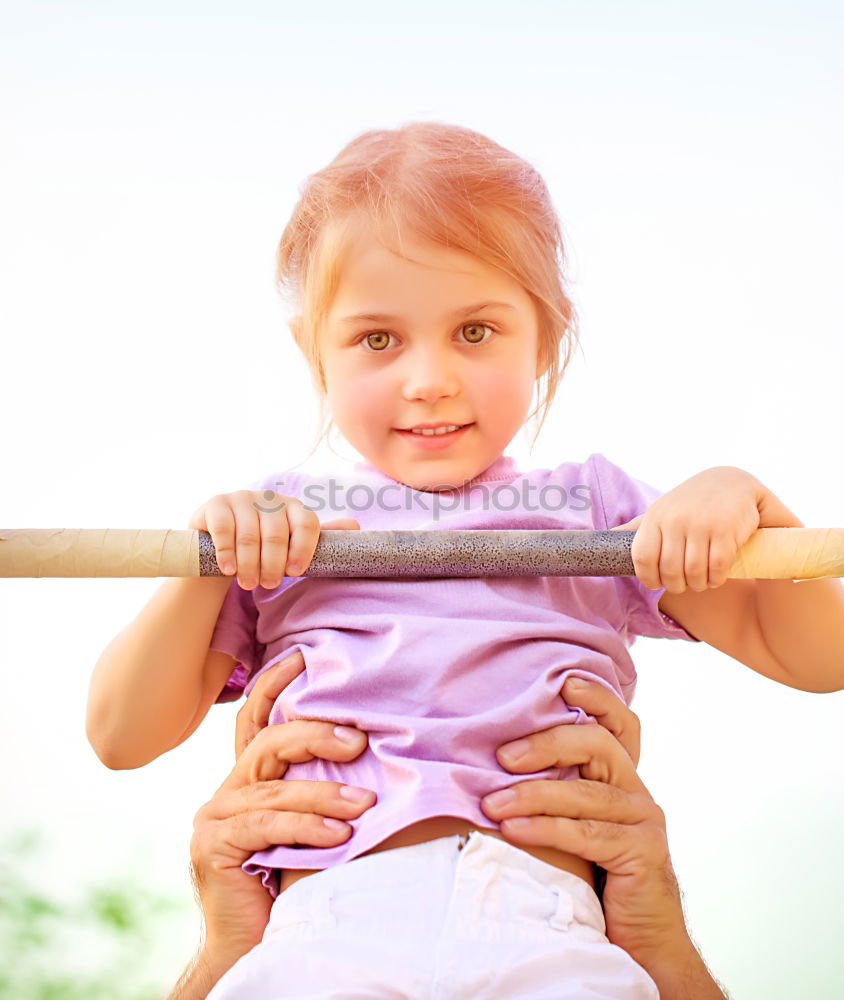 Similar – Cute black boy having fun on a swing in his parents garden