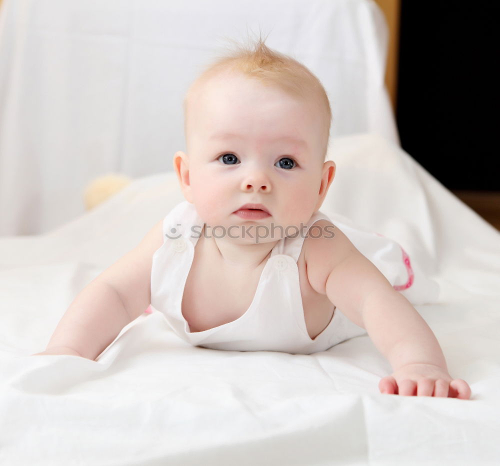 Similar – Cute Baby Girl Lying in the Crib