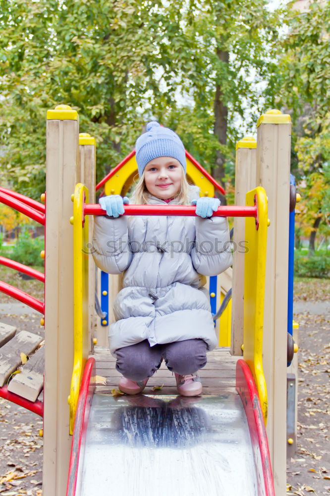 Similar – Child on a slide Joy