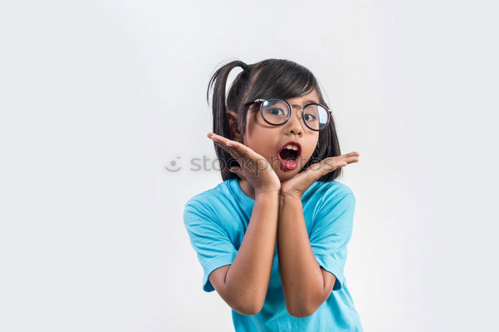 Similar – Angry young woman holding a retro clock