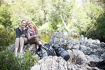 Cheerful girlfriends on nature