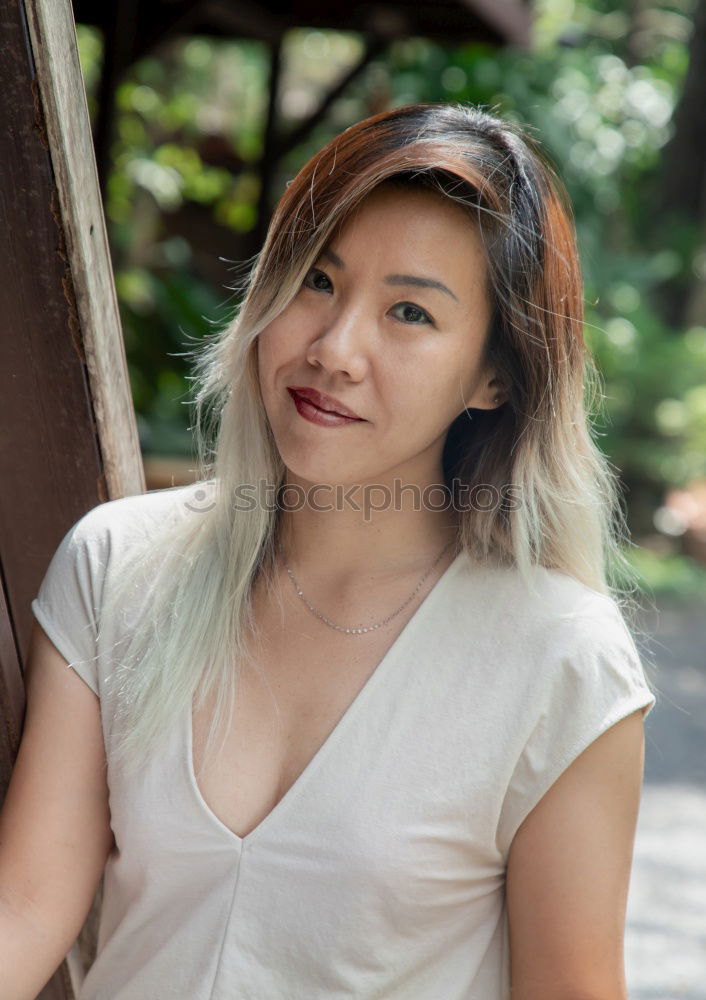 Woman with purple hair on street