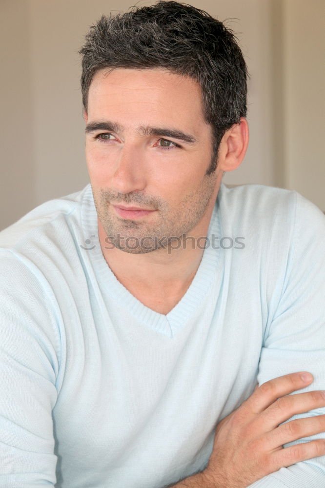 Similar – Thoughtful man with lost look near a window in a modern pub