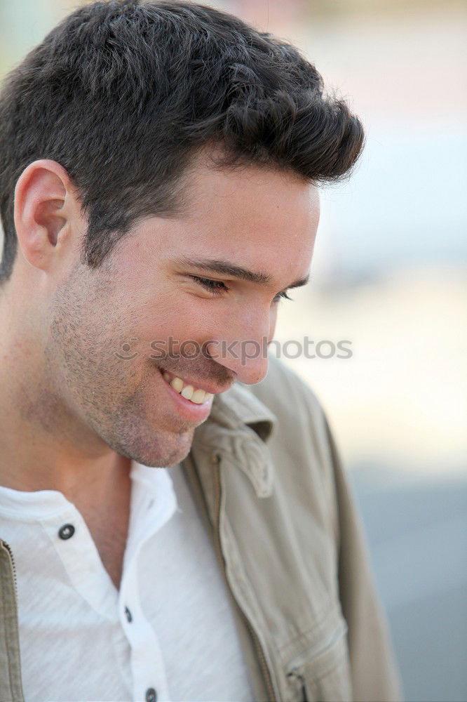 Similar – Young man smiling in urban background