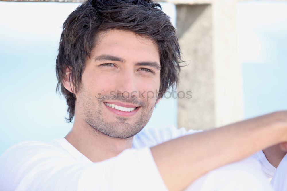 Similar – Young man smiling in urban background