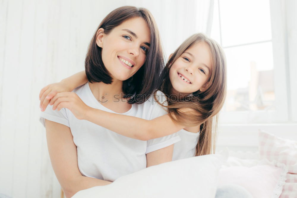 Similar – happy child boy giving flowers to mom