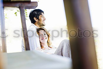 Similar – Young couple playing in front of a mirror