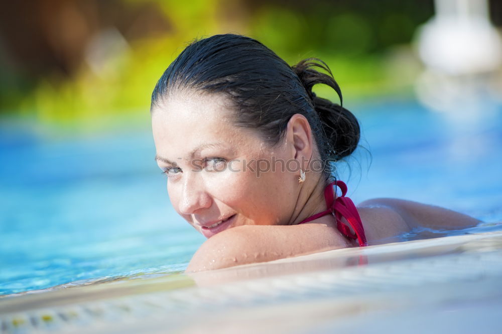 Similar – Senior old woman grey hair sitting by the swimming pool