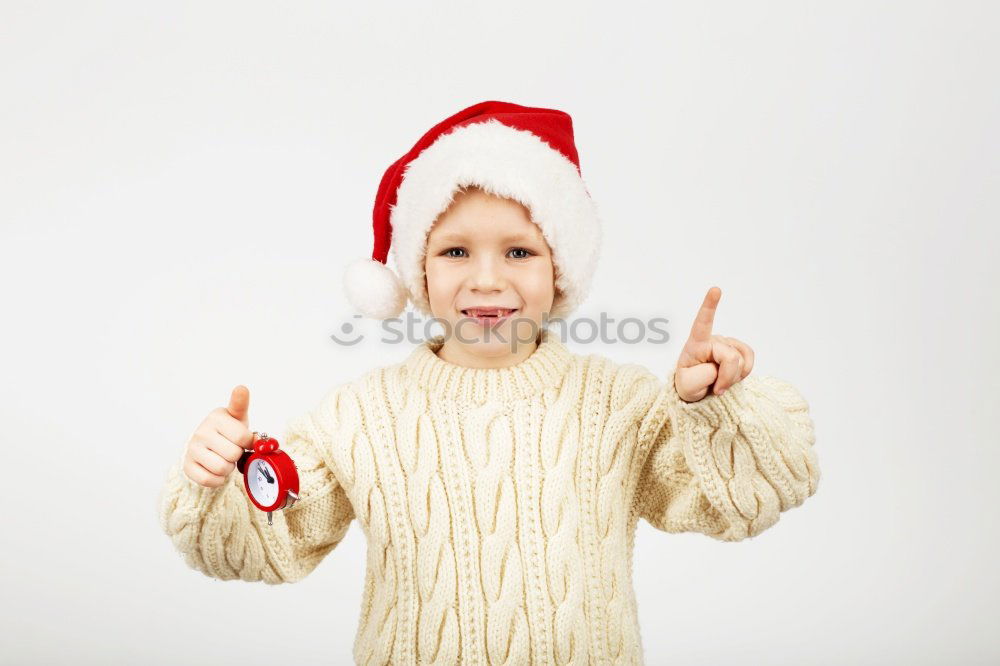 Similar – Adorable kid with Santa´s hat on Christmas day.