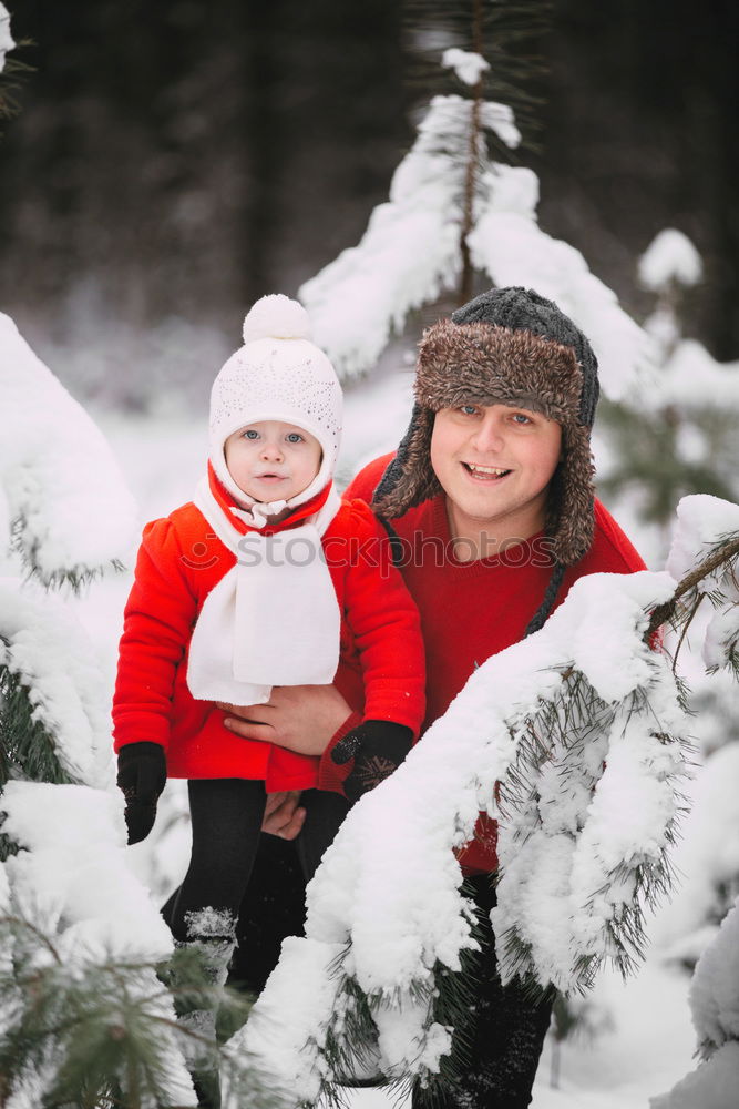 Similar – Family spending time together walking outdoors in winter