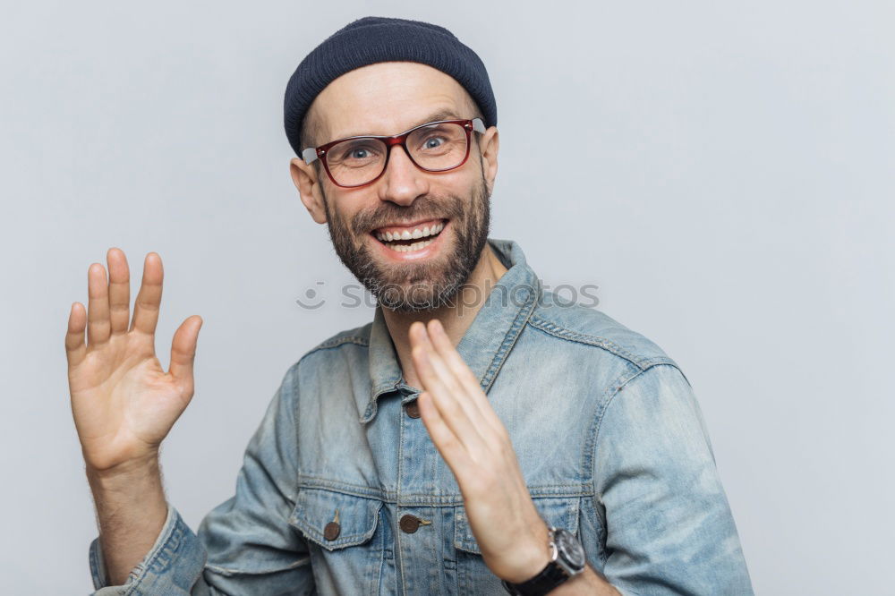 Similar – Portrait of a man with glasses and mustache with crossed arms