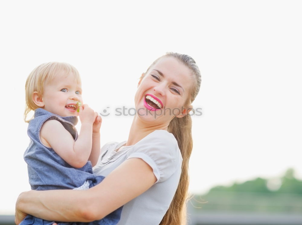 Similar – Image, Stock Photo Adorable girl and her mother in a summer day