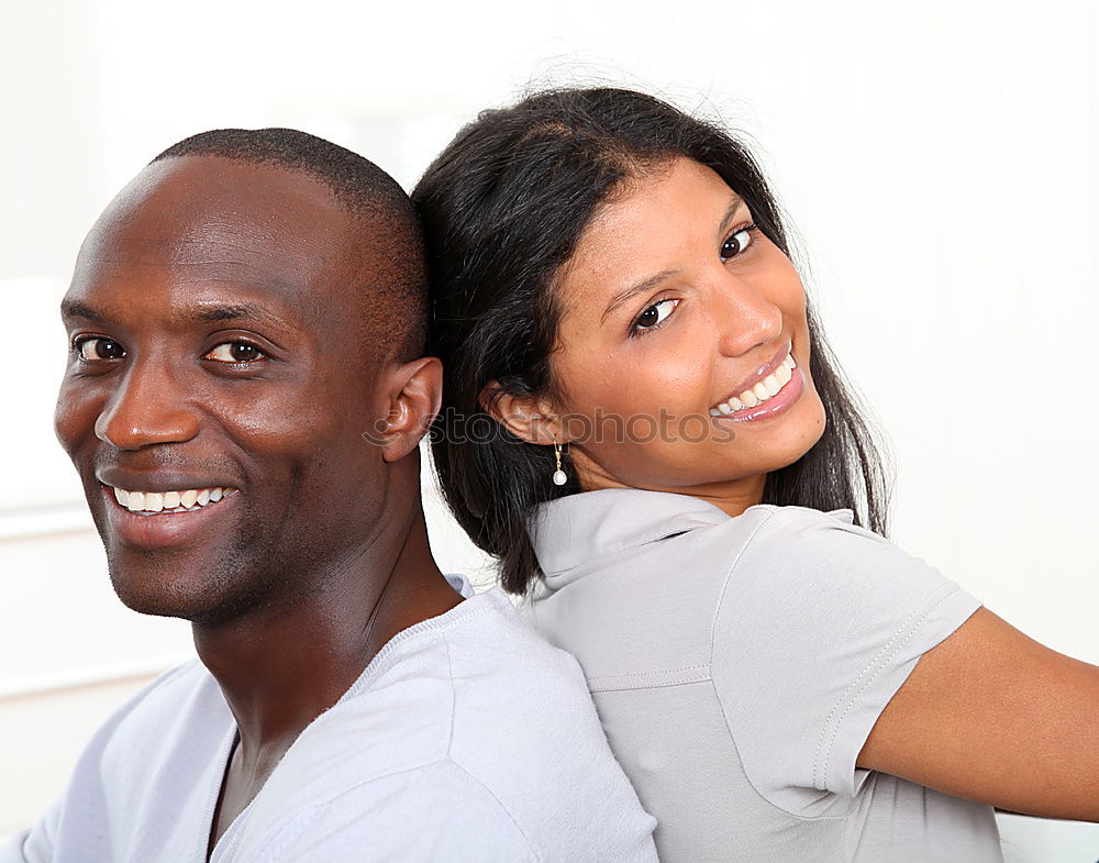 Similar – Loving Young Couple Hugging And Kissing At Home Standing In Kitchen Together