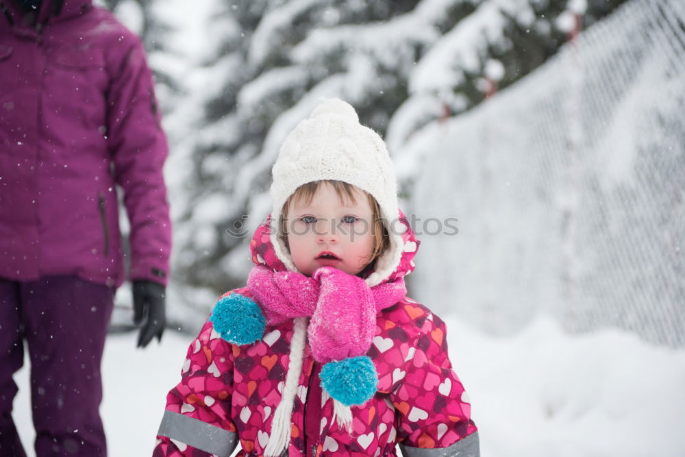 Similar – Mother and her little daughter enjoying winter