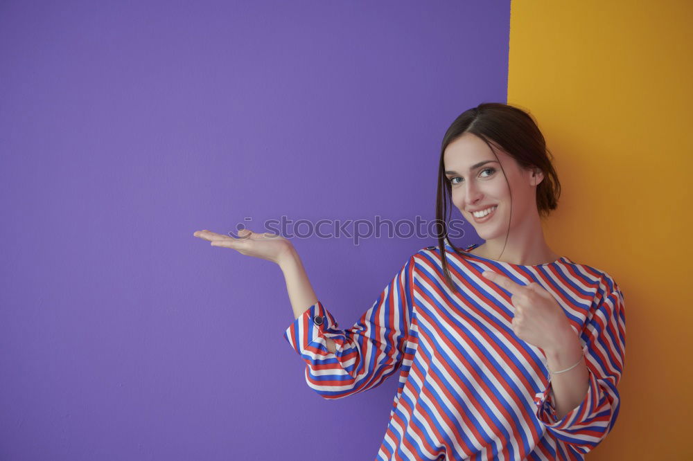 Similar – Cheerful woman in yellow jacket