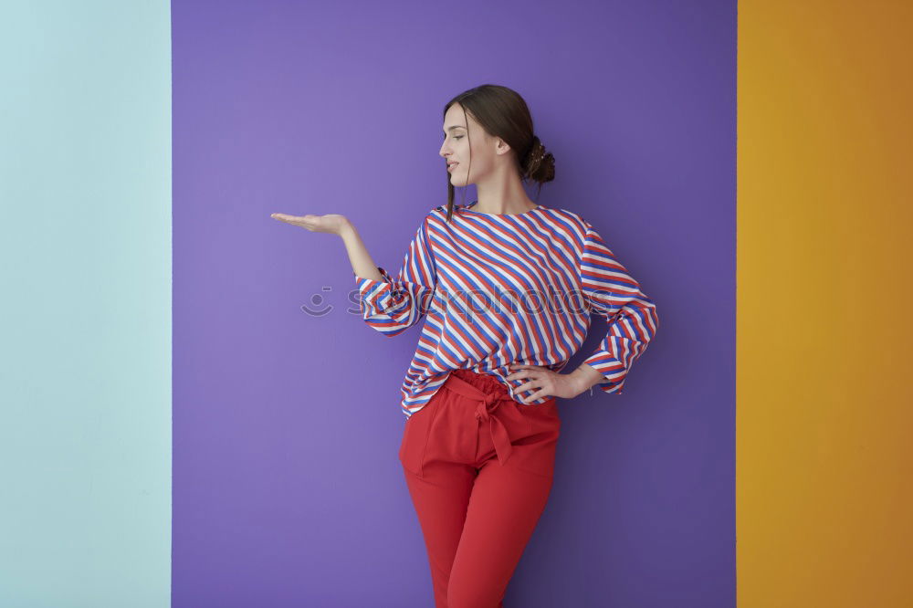 Similar – Cheerful woman in yellow jacket