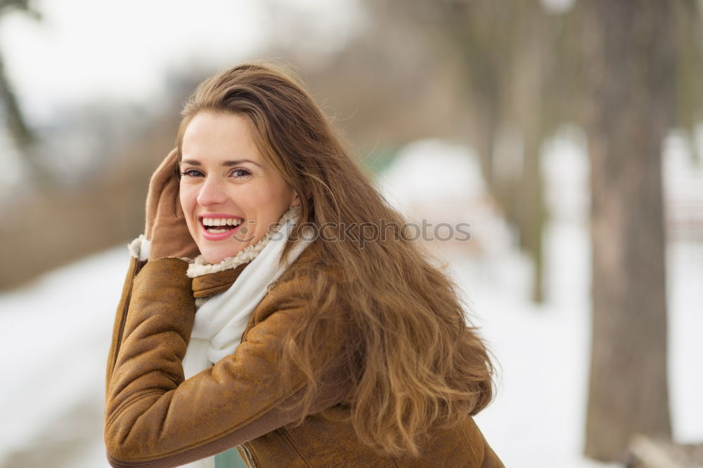 Similar – Image, Stock Photo Portrait of a Young woman using her mobile phone.