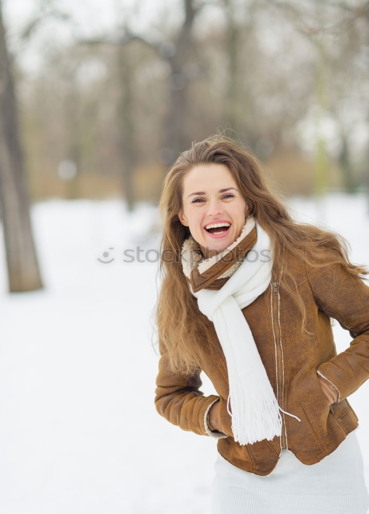 Similar – Portrait of young blonde woman in coat with fur