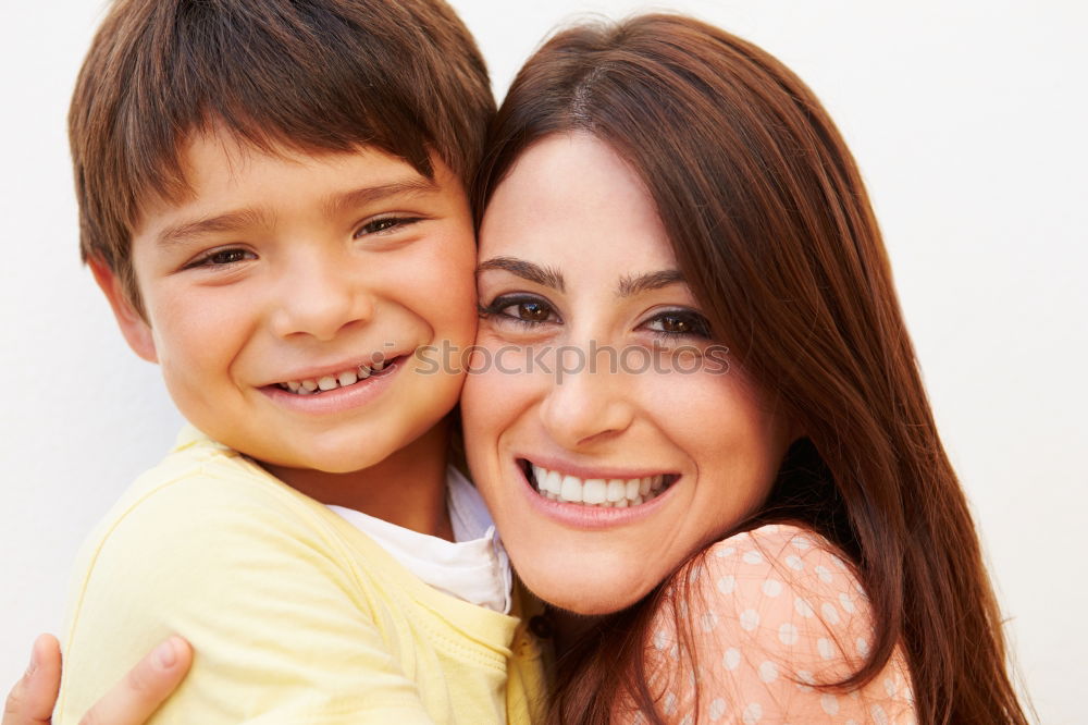 Similar – Image, Stock Photo Mother and son seated on a park