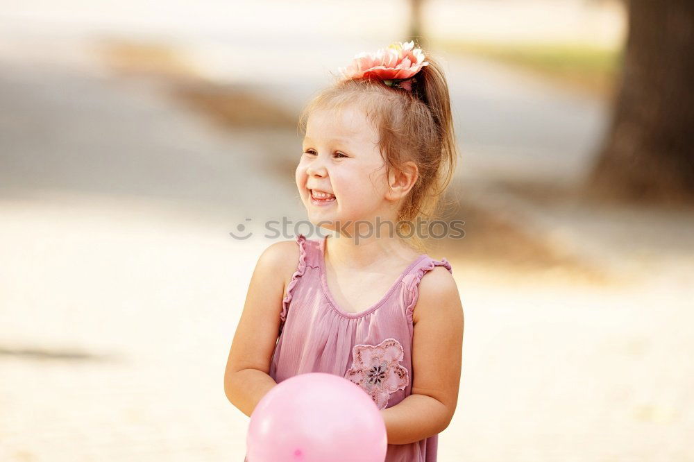 Similar – Little girl playing in a urban park