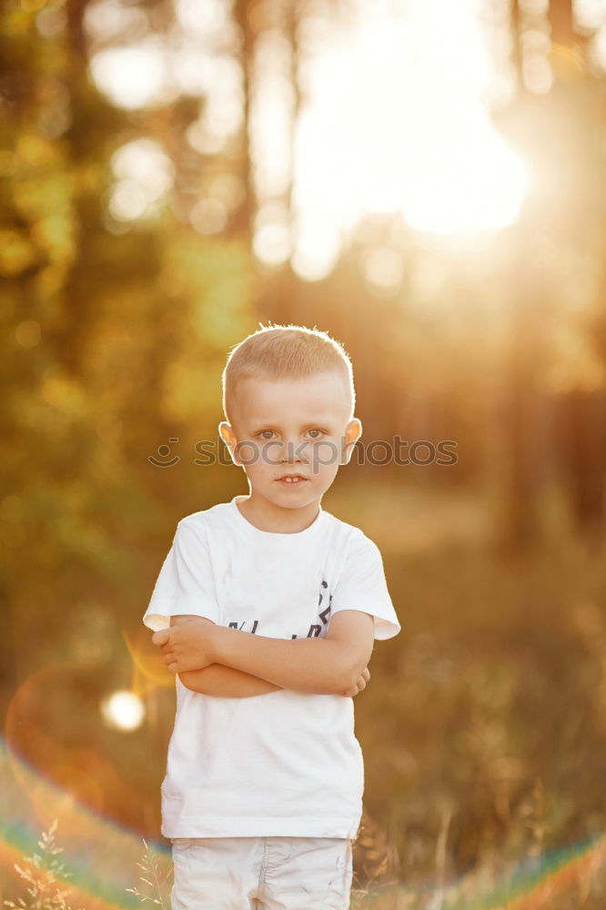 Image, Stock Photo Beautiful child with a yellow vest in the forest in autumn