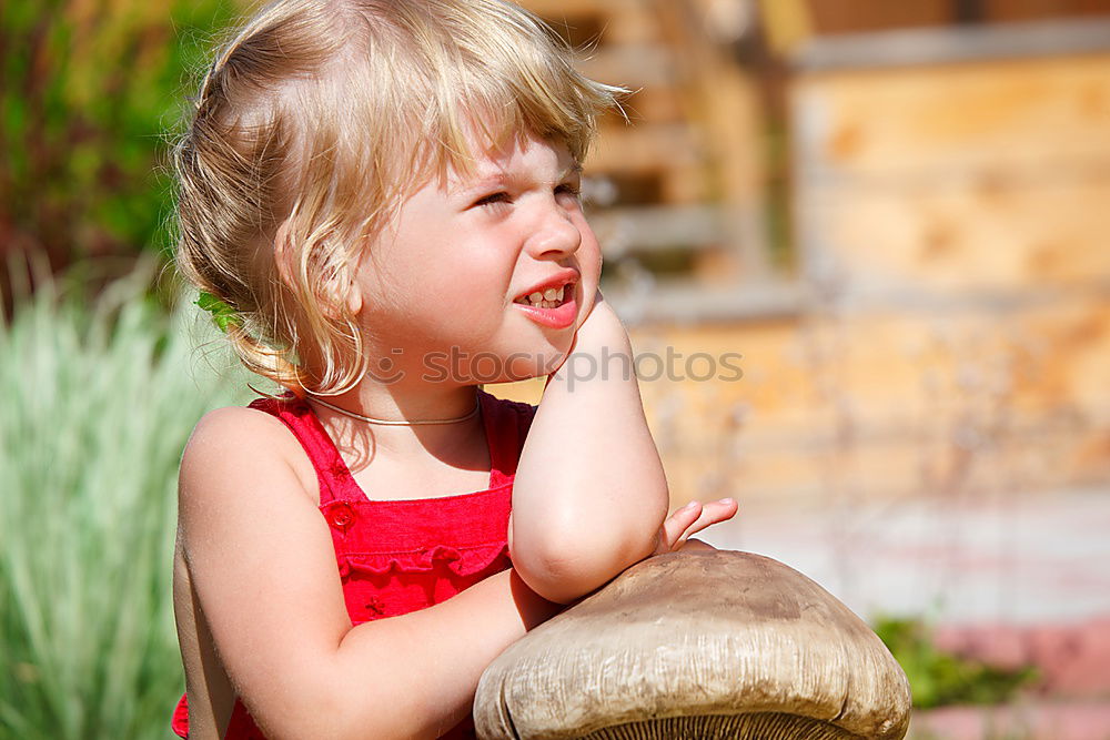 Similar – Kid girl playing with garden sprinkler