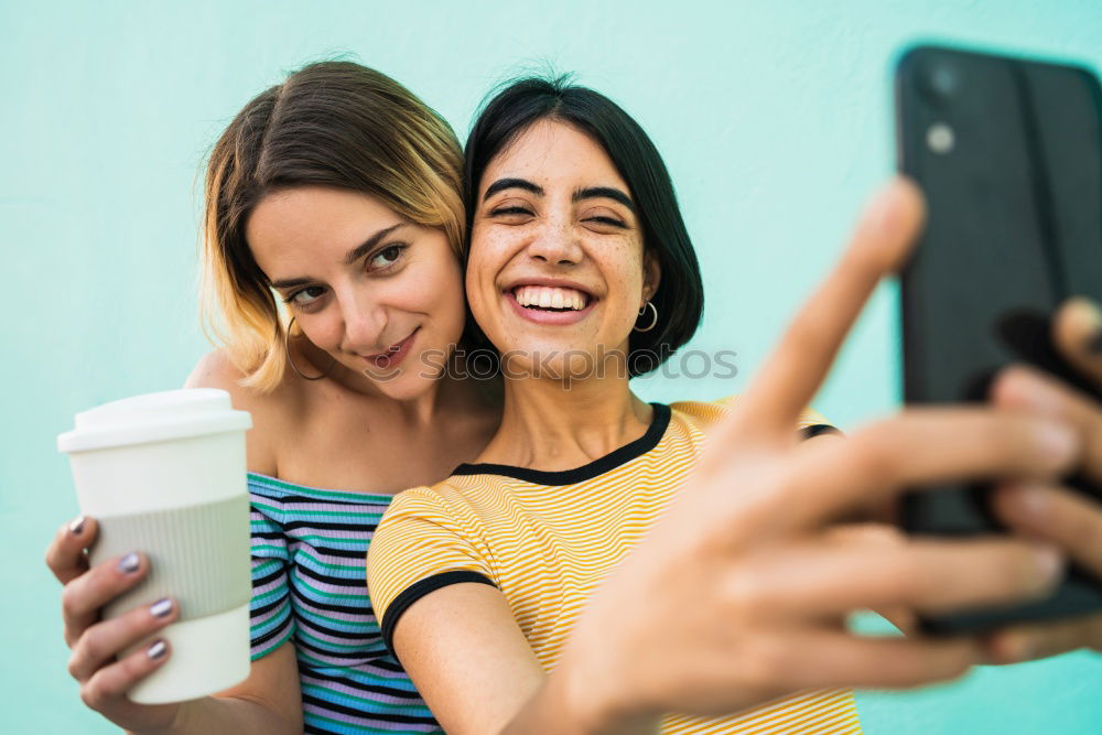 Similar – Image, Stock Photo Women taking selfie in studio