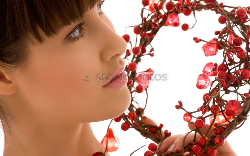 Similar – Young woman holding a little red tree