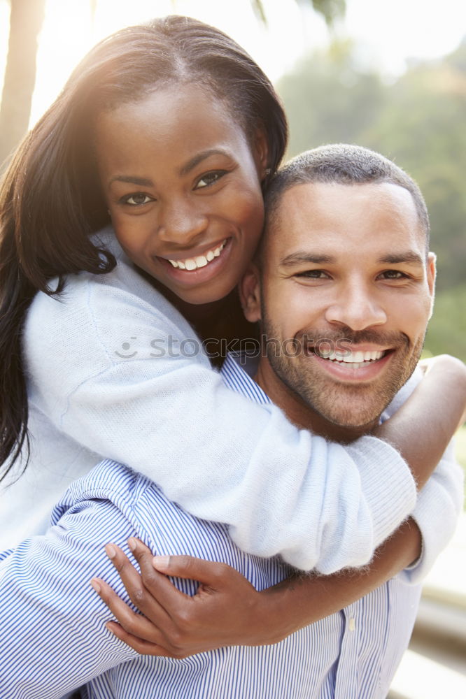 Similar – Smiling couple of lovers having fun.