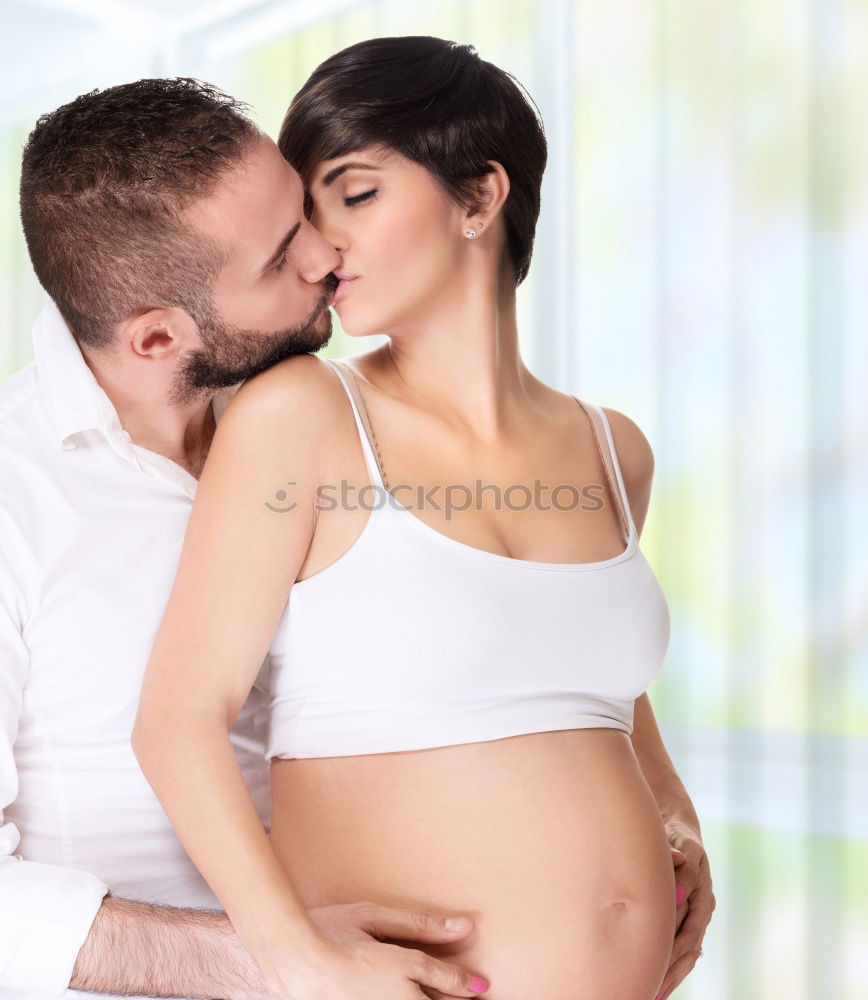 Similar – Image, Stock Photo Happy pregnant couple feeling the movements of their baby