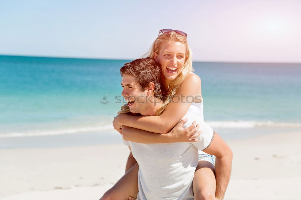 Similar – Image, Stock Photo Loving couple posing on beach