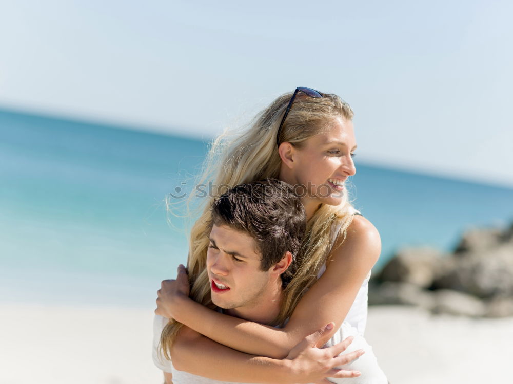 Similar – Image, Stock Photo Loving couple posing on beach